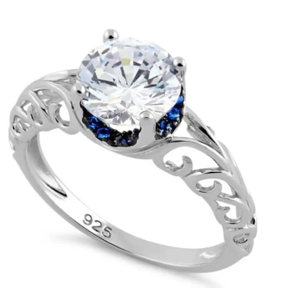 Sterling Silver Swirl Design Clear and Blue CZ Ring New
